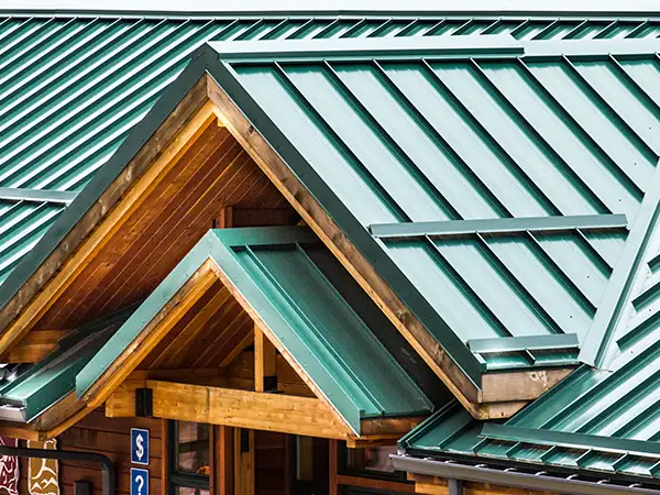 Commercial building with a green metal roof