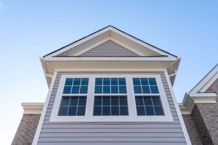 Window installation on a home by Eldred Contracting